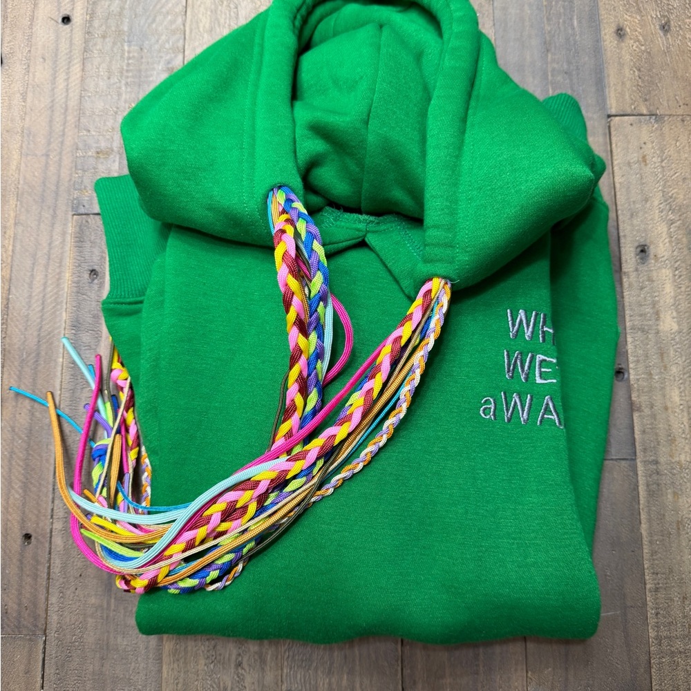 While We’re Awake Green Hoodie with Multicolor Drawstrings